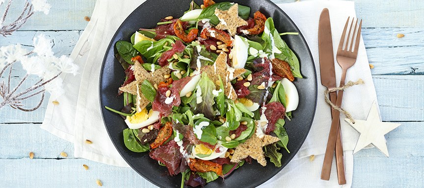 Salade met carpaccio en truffeldressing