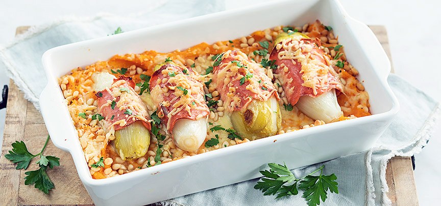 Zoete aardappelpuree met witlof uit de oven
