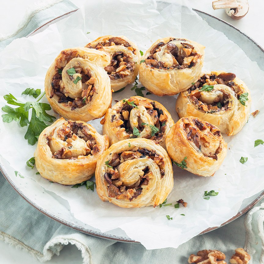  Bladerdeegrolletjes met champignons